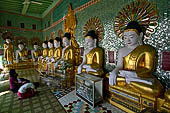 Myanmar - Sagaing hill, Umin Thounzeh (the 30 Caves), a colourful crescent-shaped colonnade within which there are 45 Buddha images. 